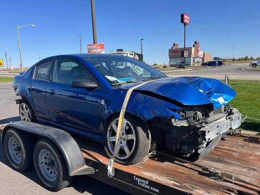 Junk car removal in Centennial Beach